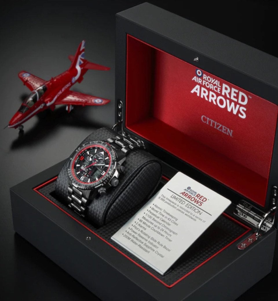 Citizen Royal Air Force Arrows watch presented in a black gift box with a red interior, alongside a red model jet and a product card.